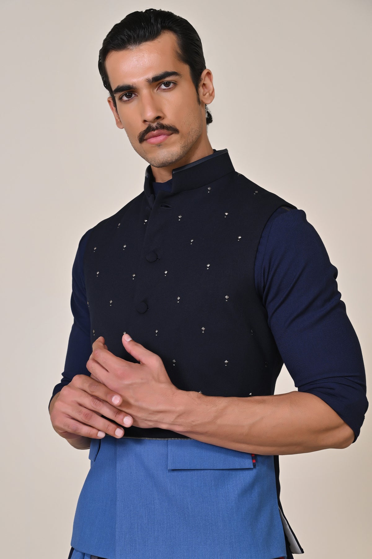 Color-Blocked Waistcoat with Rivet Accents.