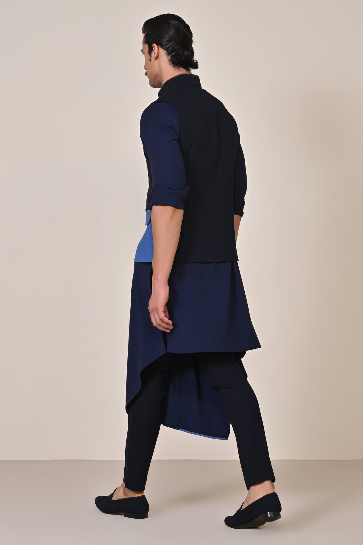 Color-Blocked Waistcoat with Rivet Accents.