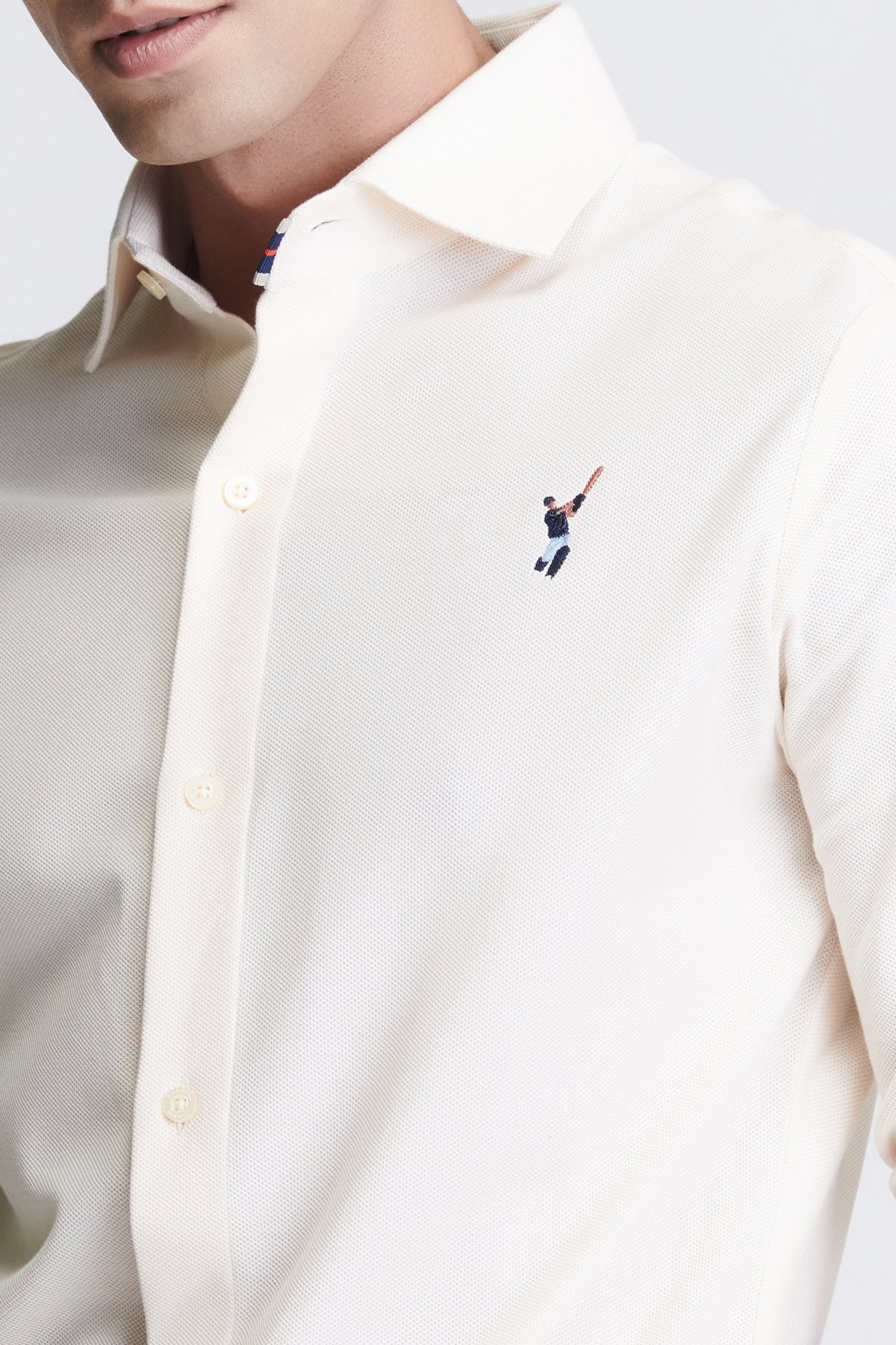 SNCC Off White Shirt with Batsman Logo