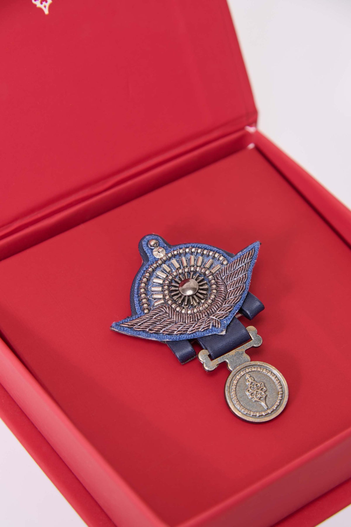 Metal-Embellished Navy Brooch