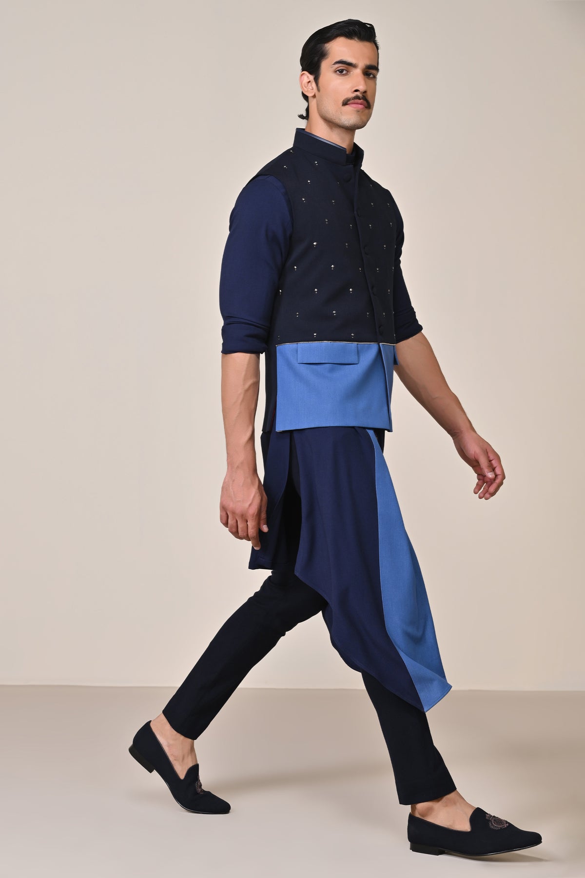 Color-Blocked Waistcoat with Rivet Accents.